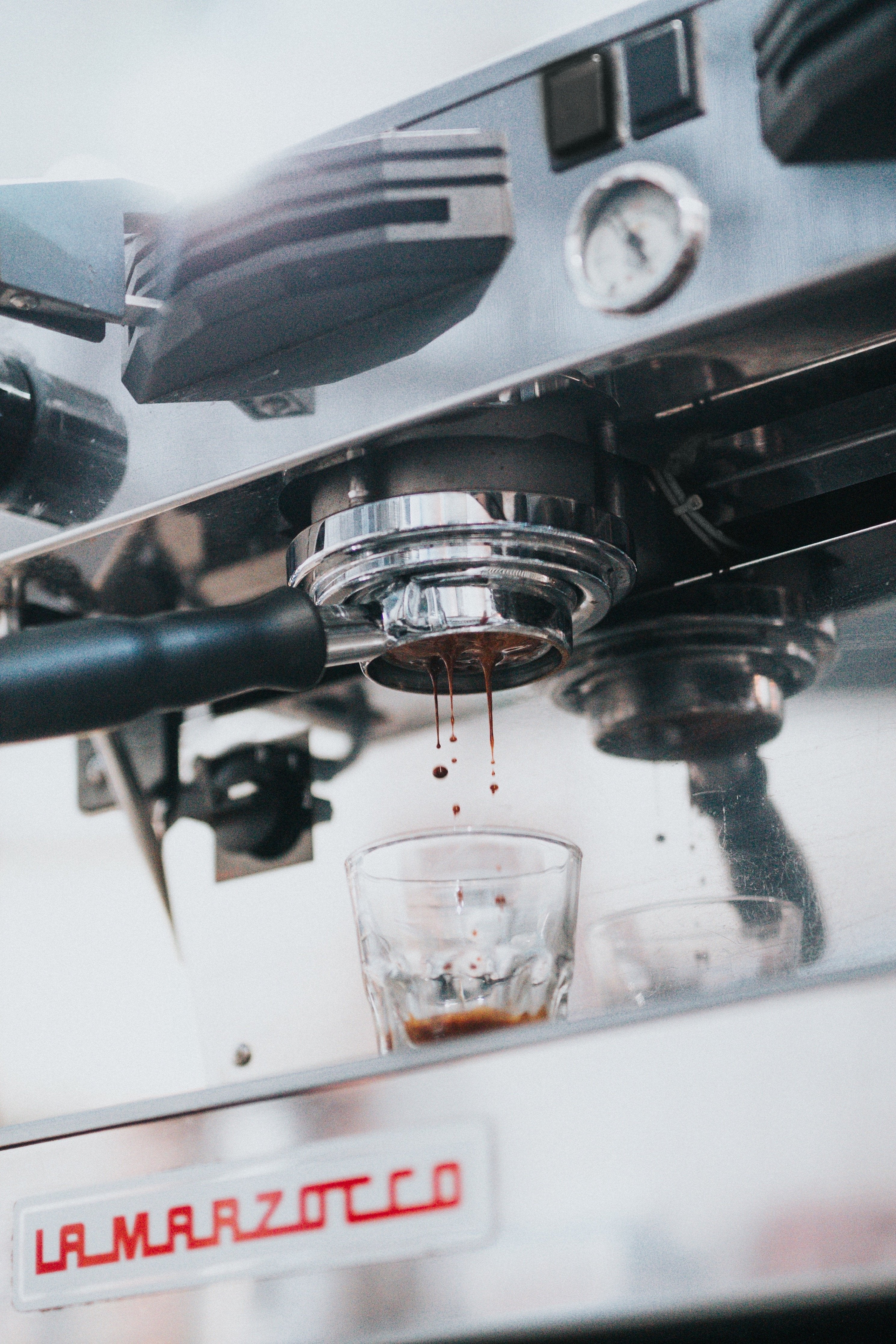 Pulling a shot of espresso on a La Marzocco espresso machine.